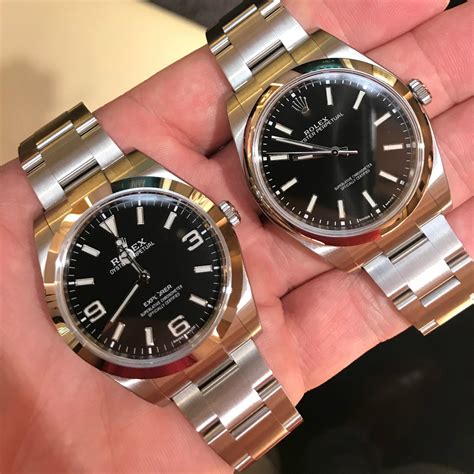 rolex oyster perpetual 39 black vs explorer 1|14270 vs 114270.